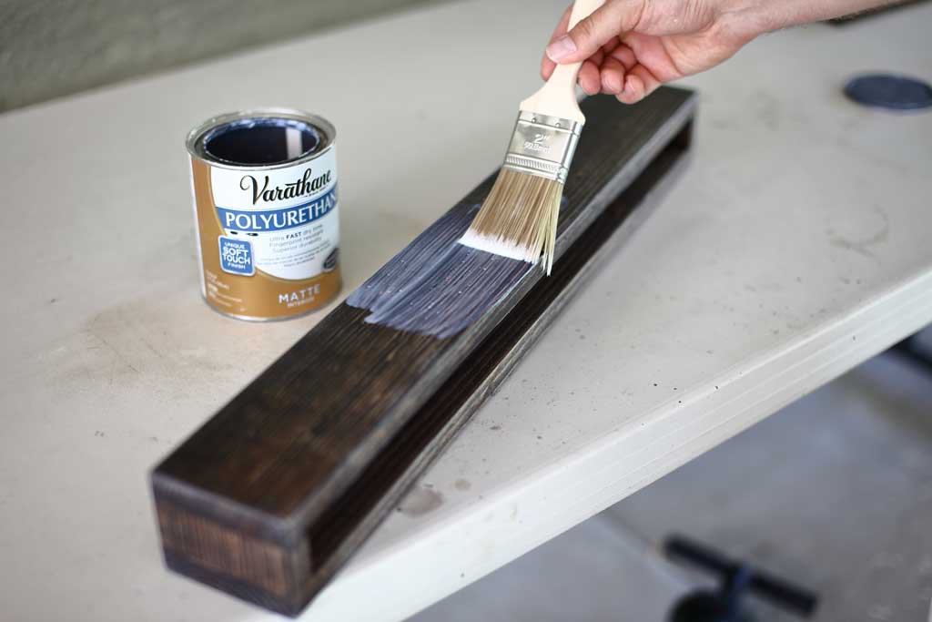 applying polyurethane on DIY towel bar