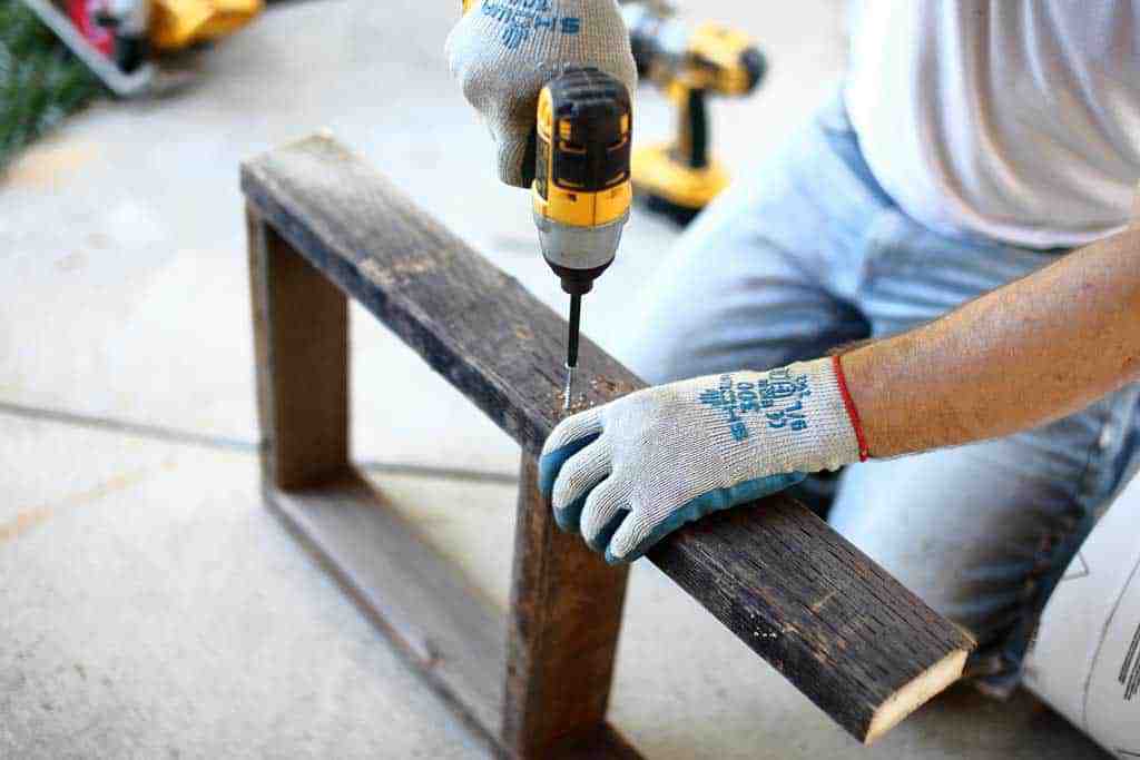 attaching the front frame together for the skunk trap