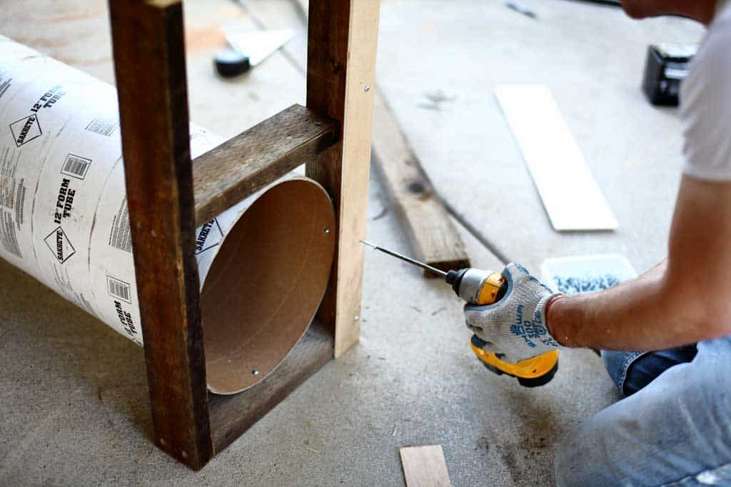 attaching front door slides of the DIY skunk trap