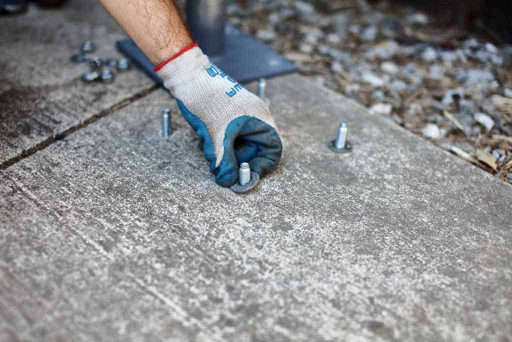 adding washers to anchors to level the post