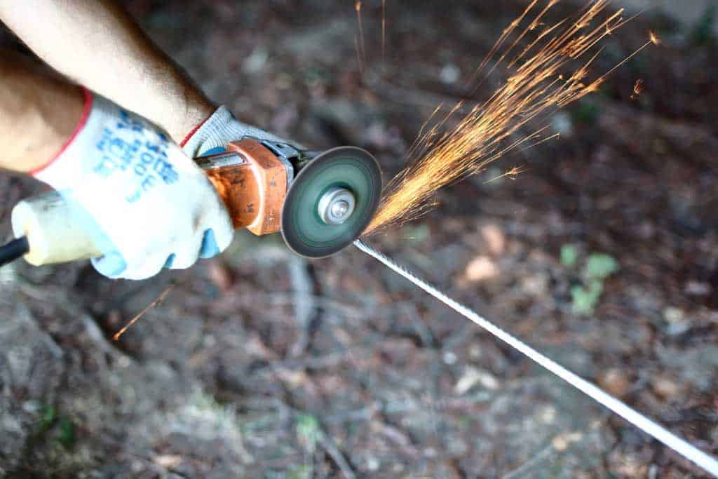 cutting zip line with grinder
