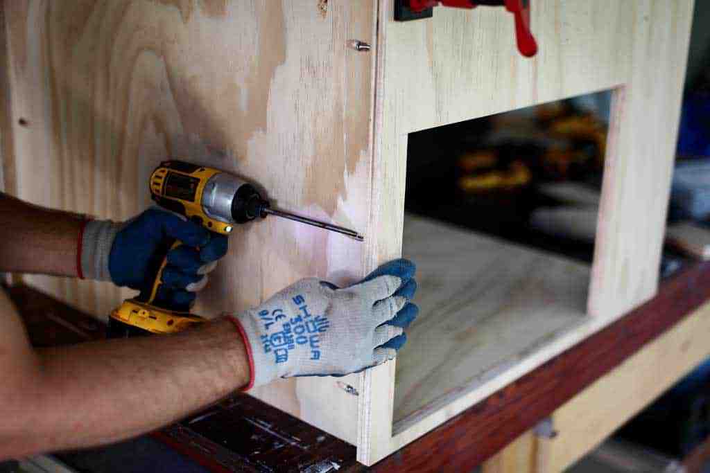 attaching front frame to the cabinet