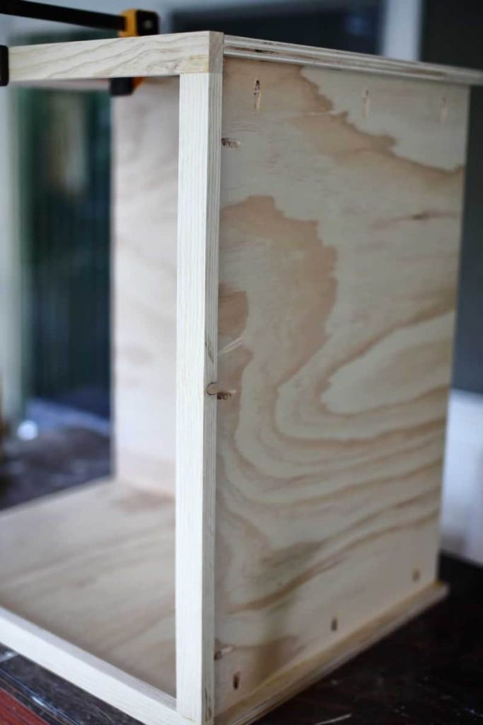 attaching front frame of the diy backroom cabinet