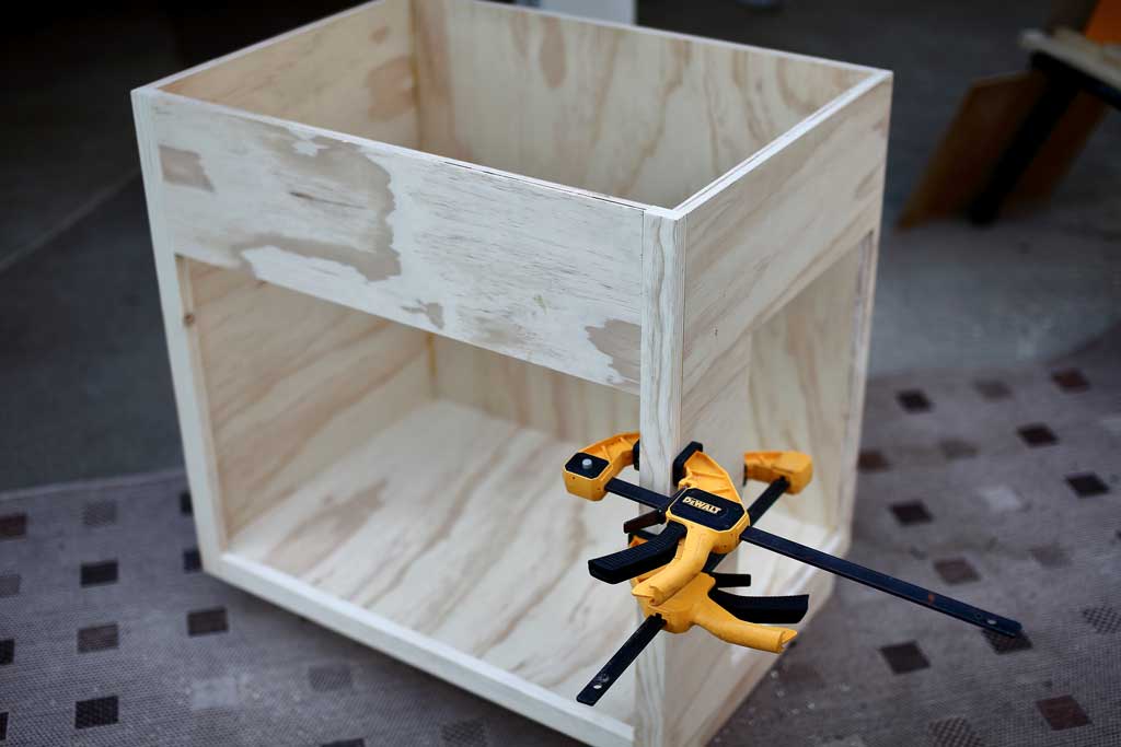 attaching front frame of the diy backroom cabinet