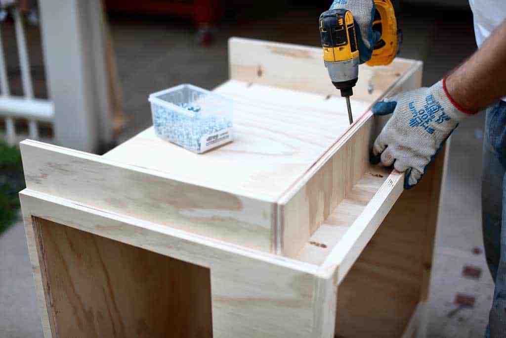 attaching base of the cabinet door