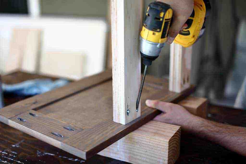 attaching drawer slider support the cabinet door