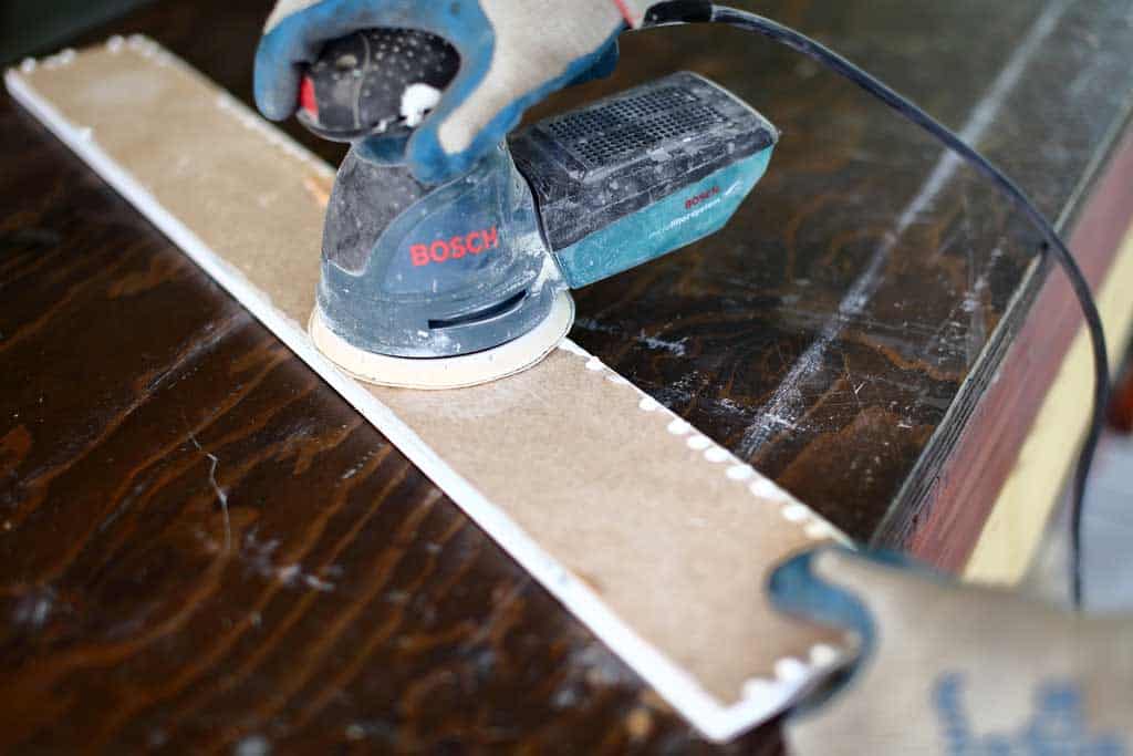 sanding back of backsplash to remove epoxy