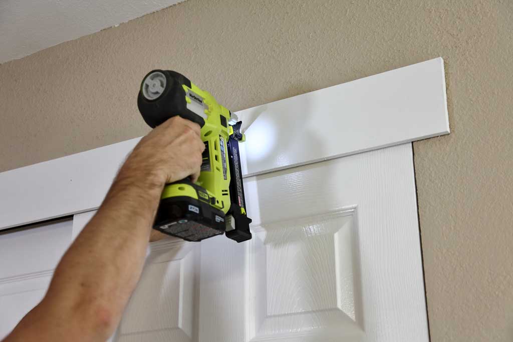 attaching decor board over the closet doors