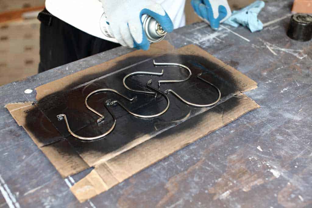 spray painting the jar straps