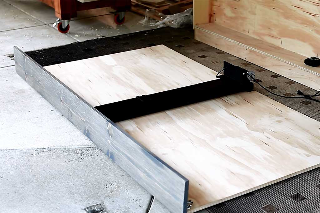 attaching tv lift for the DIY Farmhouse Media Console with TV Lift