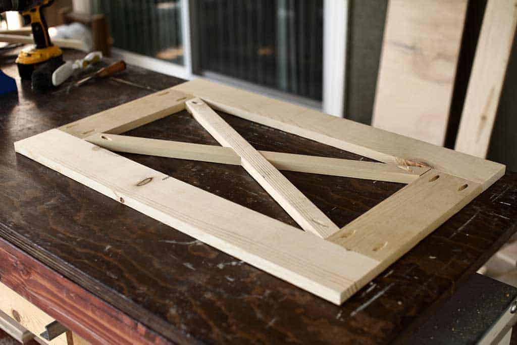 making a cross for farmhouse barn doors