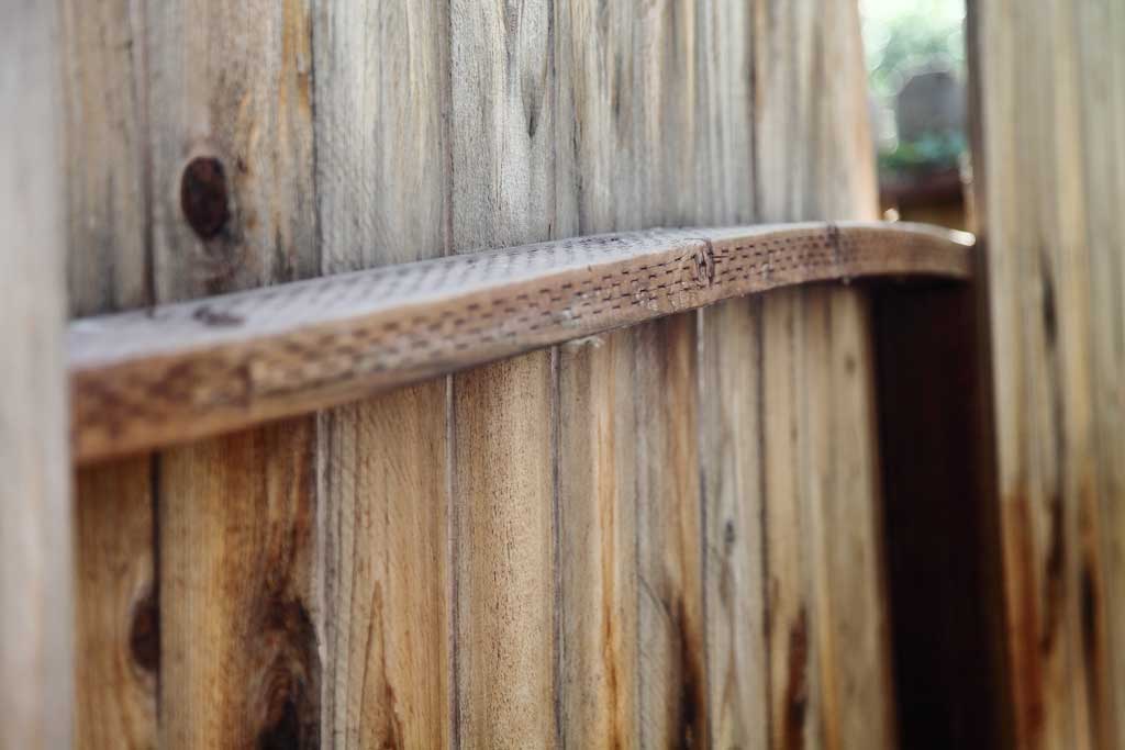 What causes wood to warp