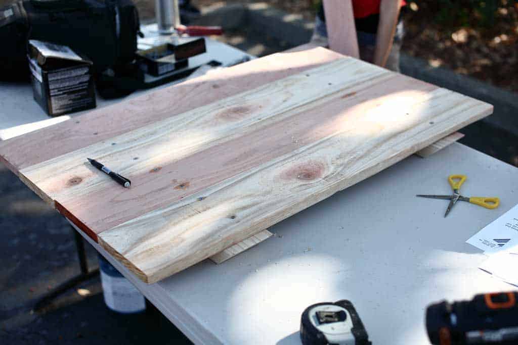 attaching bottom boards for the DIY Sandbox Table