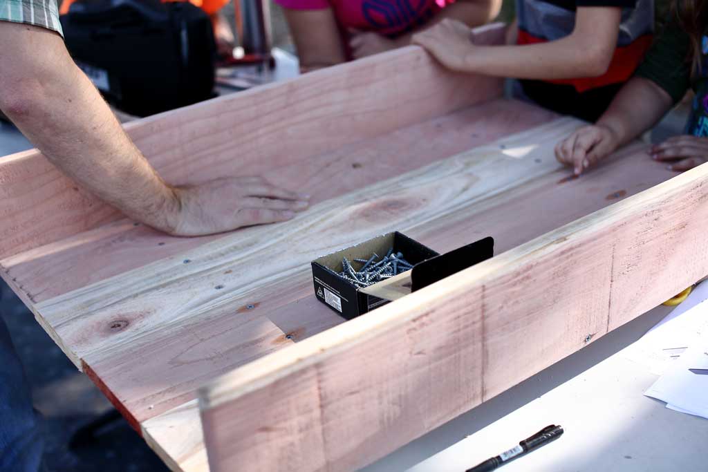 attaching side pieces for the diy sandbox