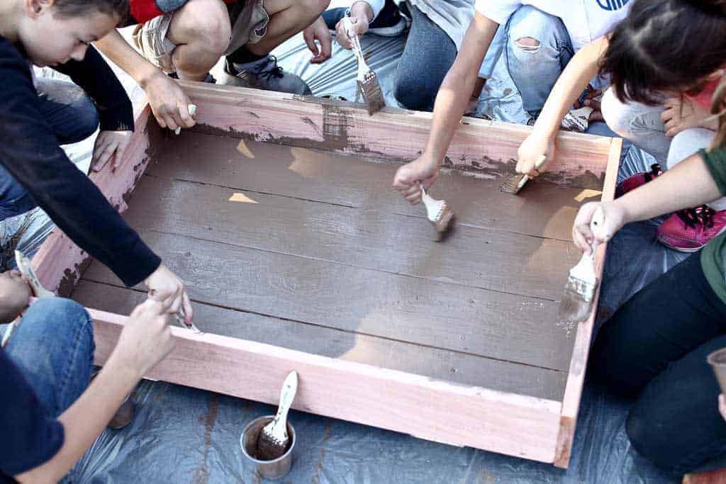 kids painting sandbox