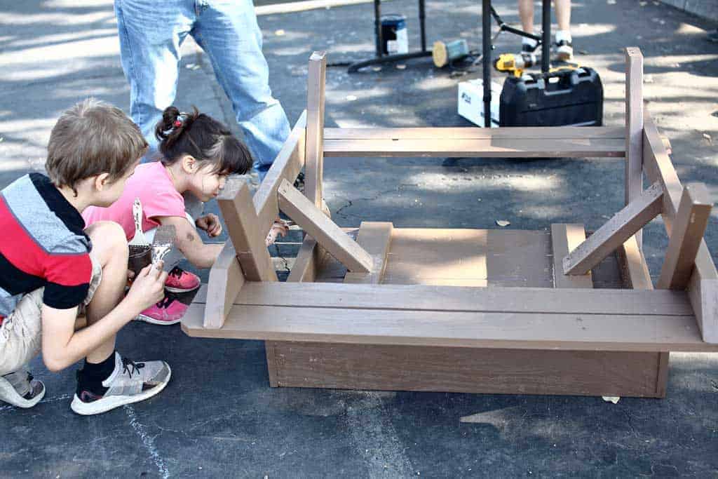 kids painting DIY Sandbox Table