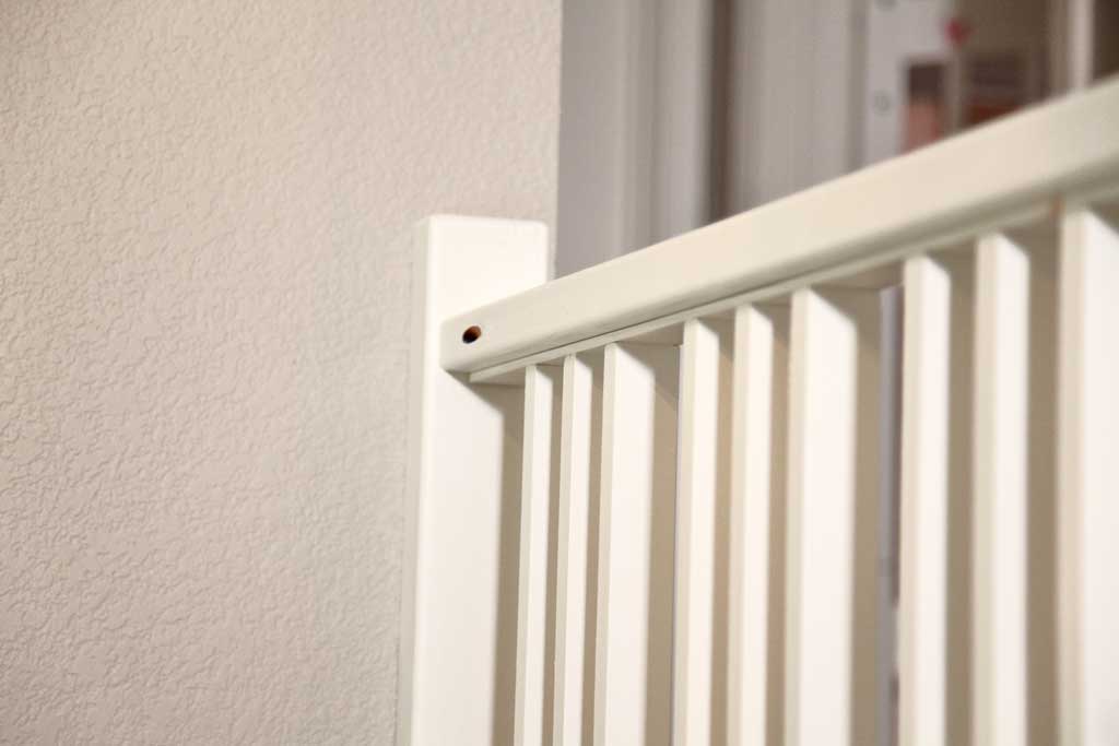 attaching handrail to the post of the diy staircase railing