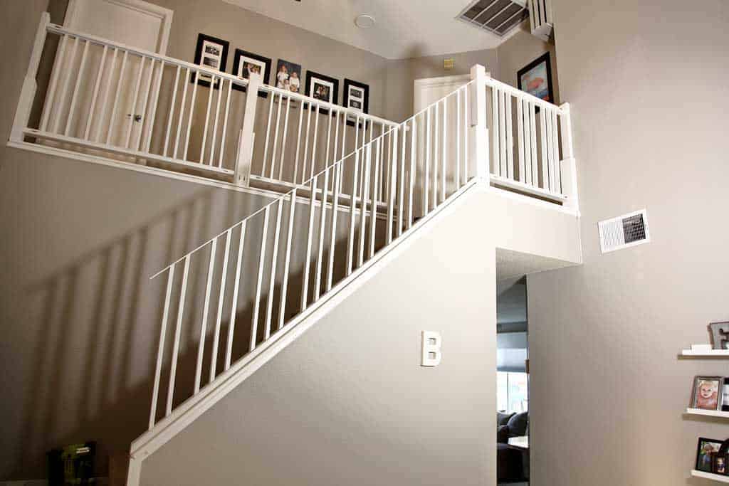 attaching sloped section of the diy staircase railing
