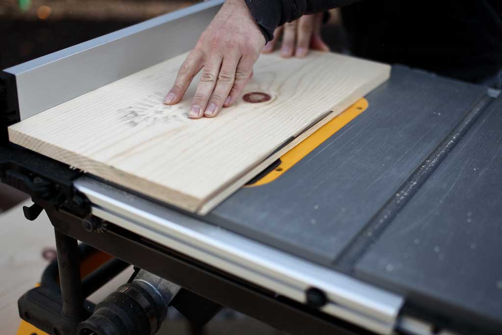 cutting wood on table saw