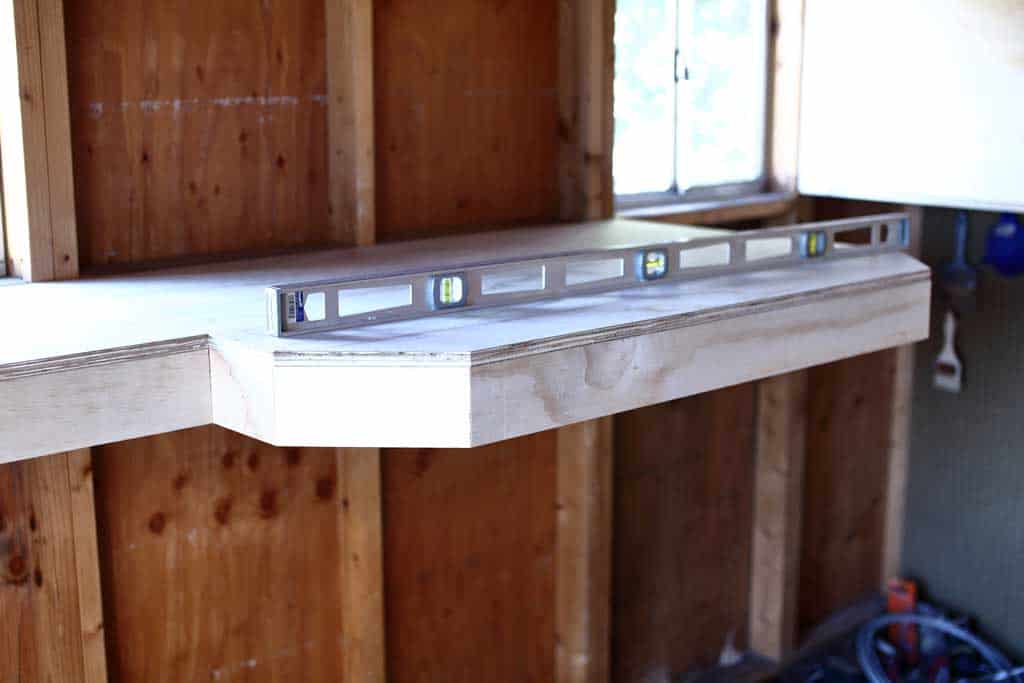 making sure the shelf is leveled