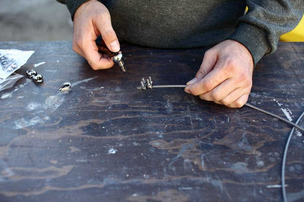 clamping cable clamps to the aircraft cable