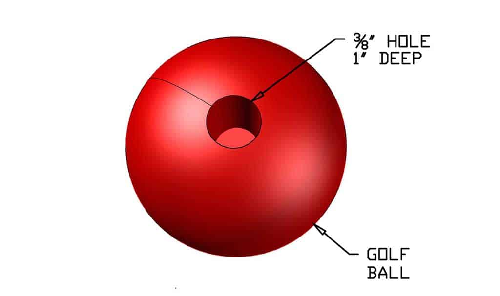drilling hole in a golf ball