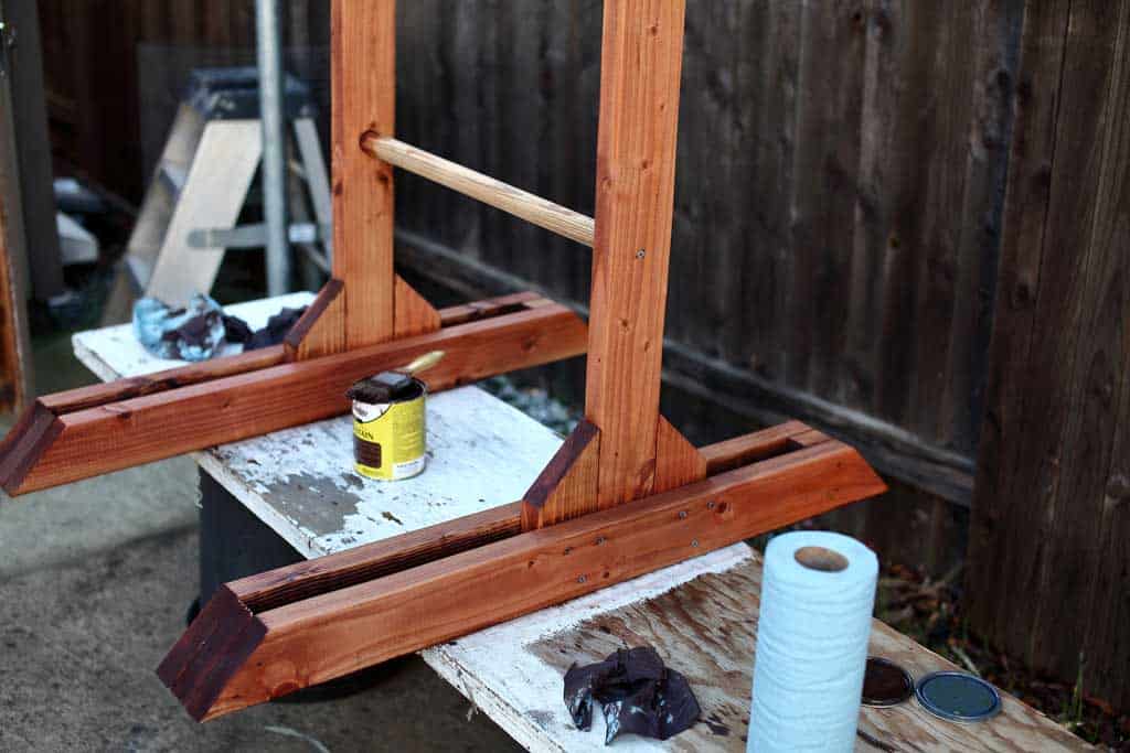 staining DIY wooden ladder toss game