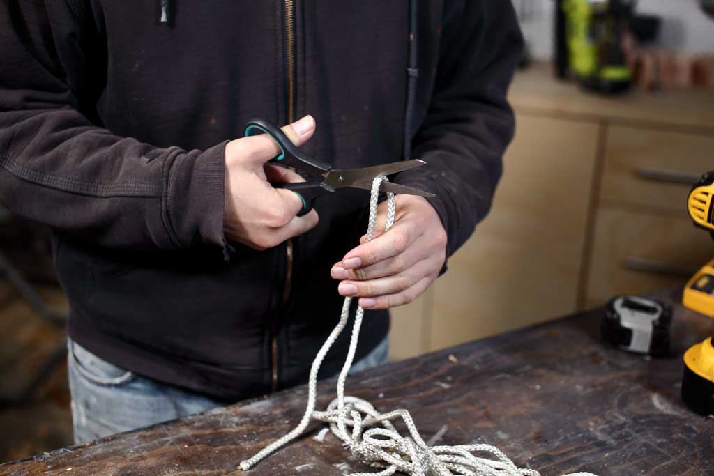 cutting rope with scissors