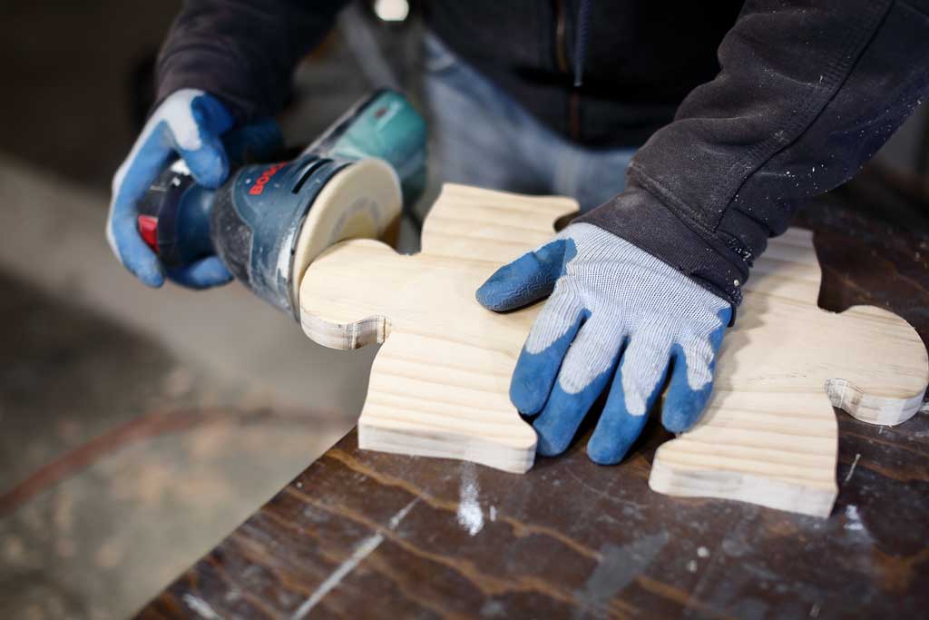 using random orbital sander to send the puzzle piece