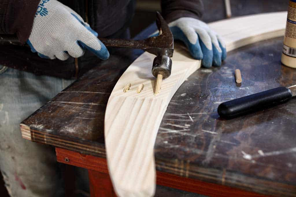 hammering dowels into the pocket holes