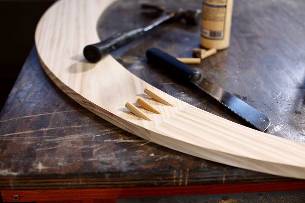 inserting dowels into the pocket holes