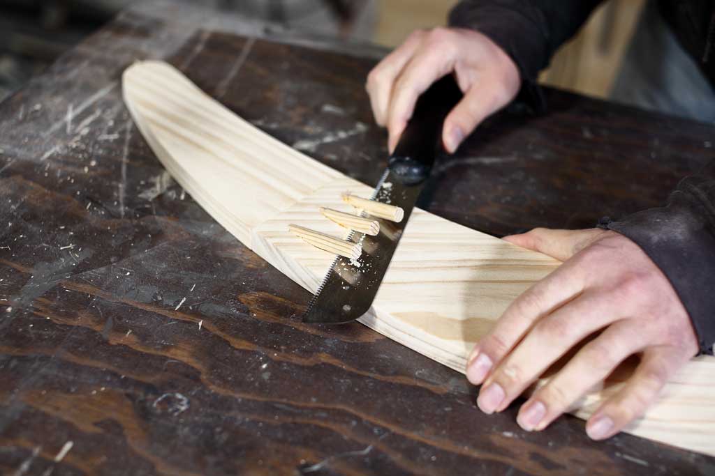 cutting off wood dowels to cover up pocket holes
