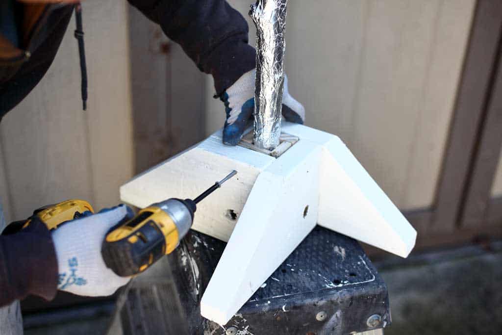 driving in a screw into a fairy tree base