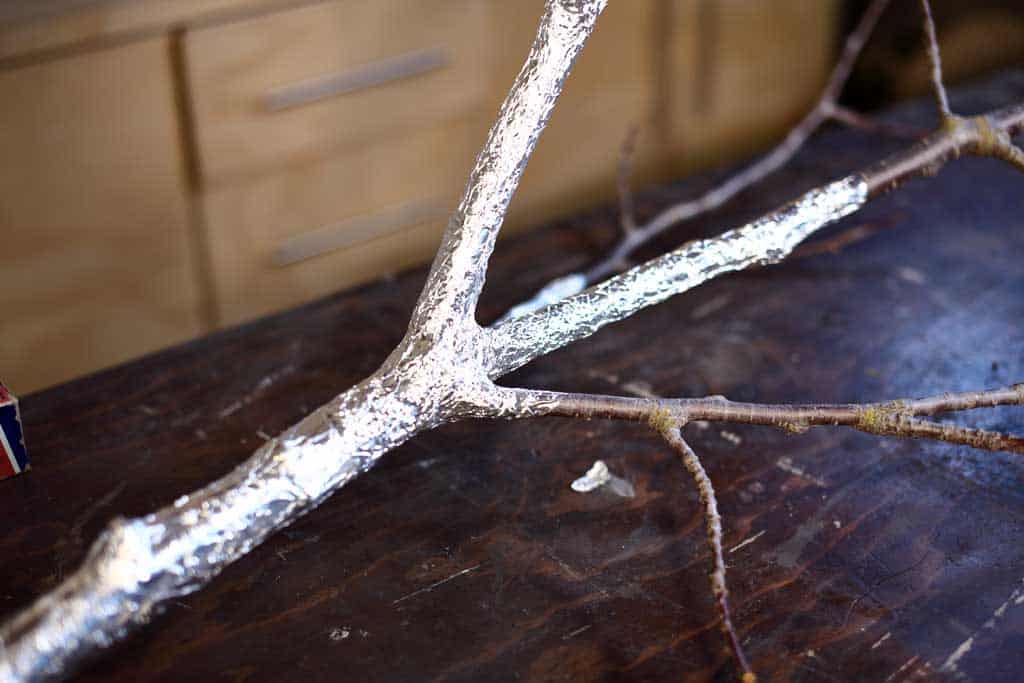 tree twigs wrapped with foil