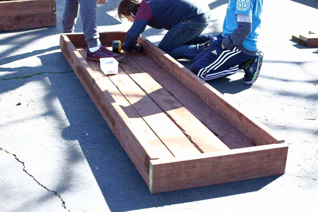 attaching lower section of the planter box