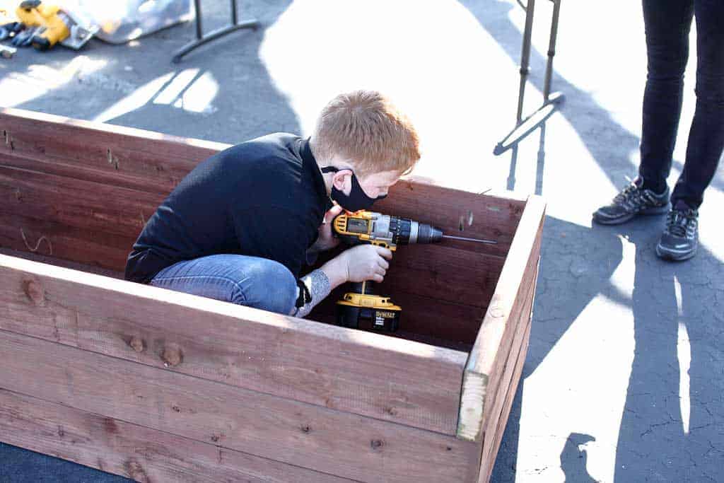 drilling pocket holes to assemble planter box