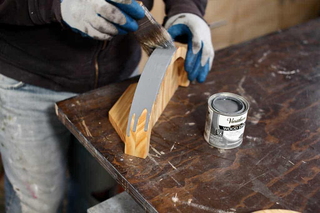 applying wood stain on wood