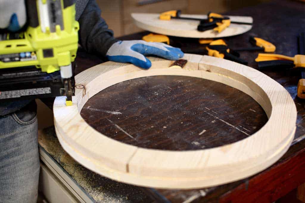 using nail gun to staple wood