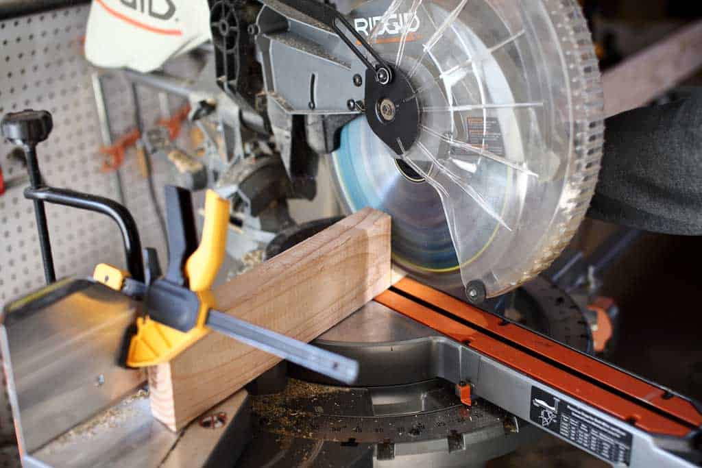 cutting wood with miter saw