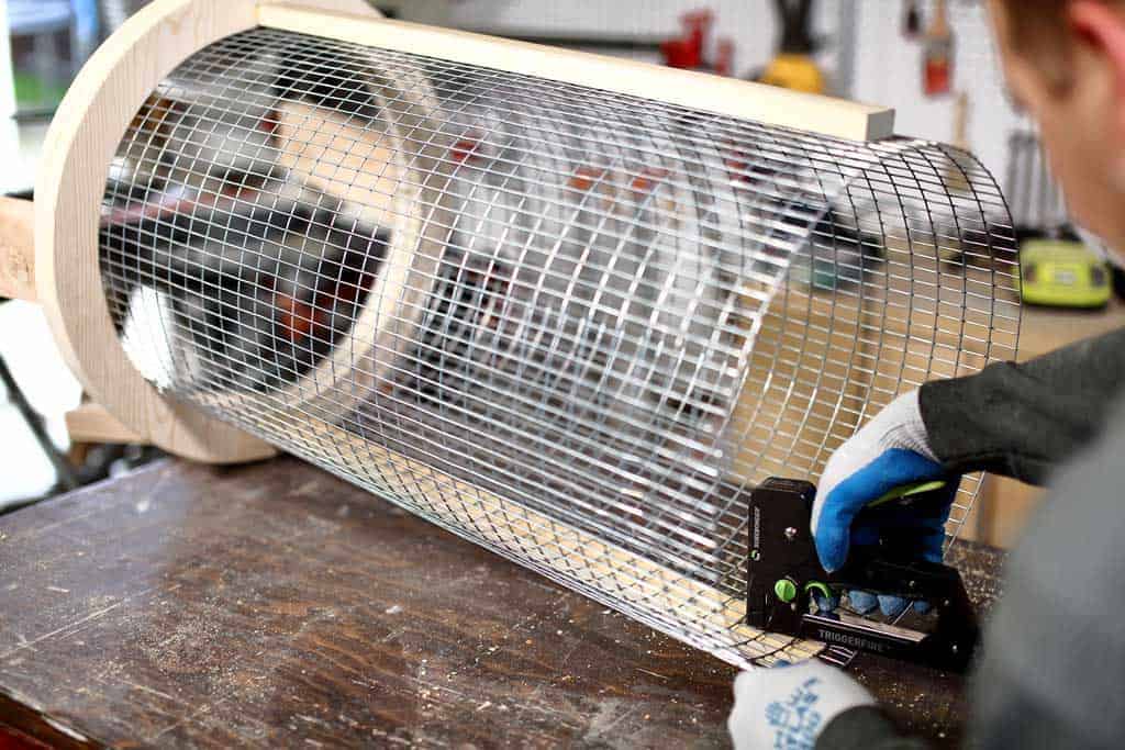 stapling wire mesh screen to side boards