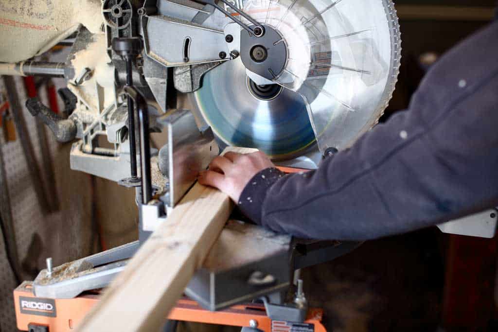 cutting wood with miter saw