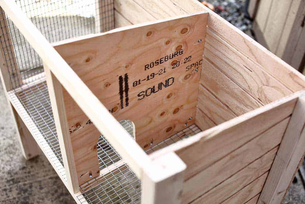 attaching middle divider of the DIY rabbit hutch