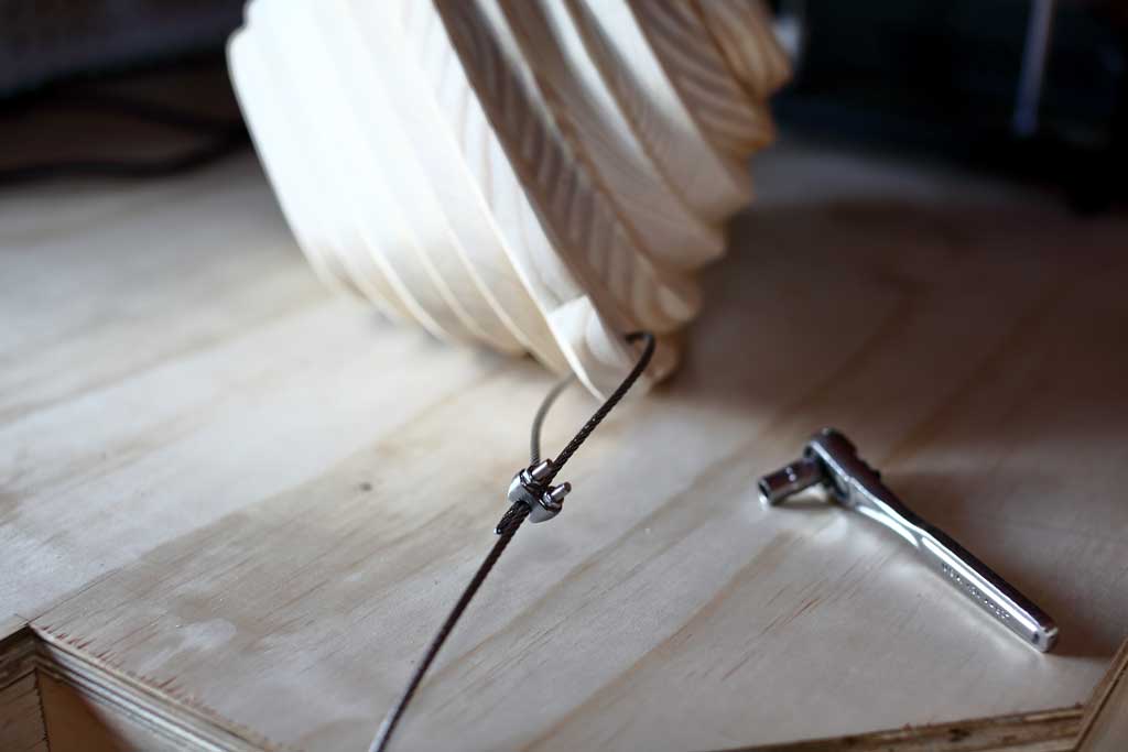 attaching air craft cable to birdhouse