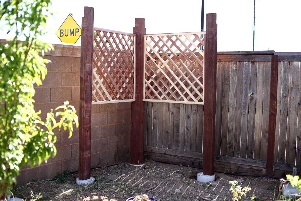 installing trellis panels for arbor