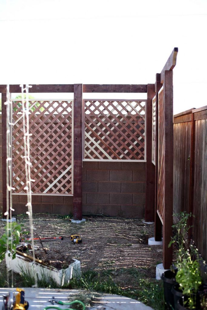 installing roof boards for DIY Garden Arbor with a Bench