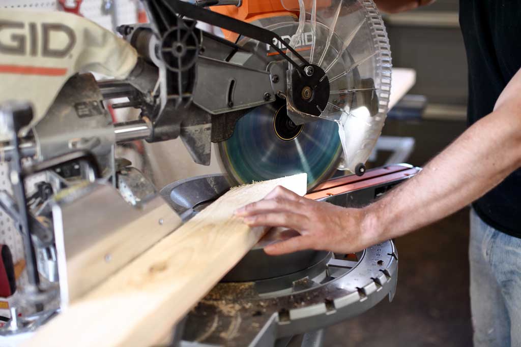 using miter saw to cut wood