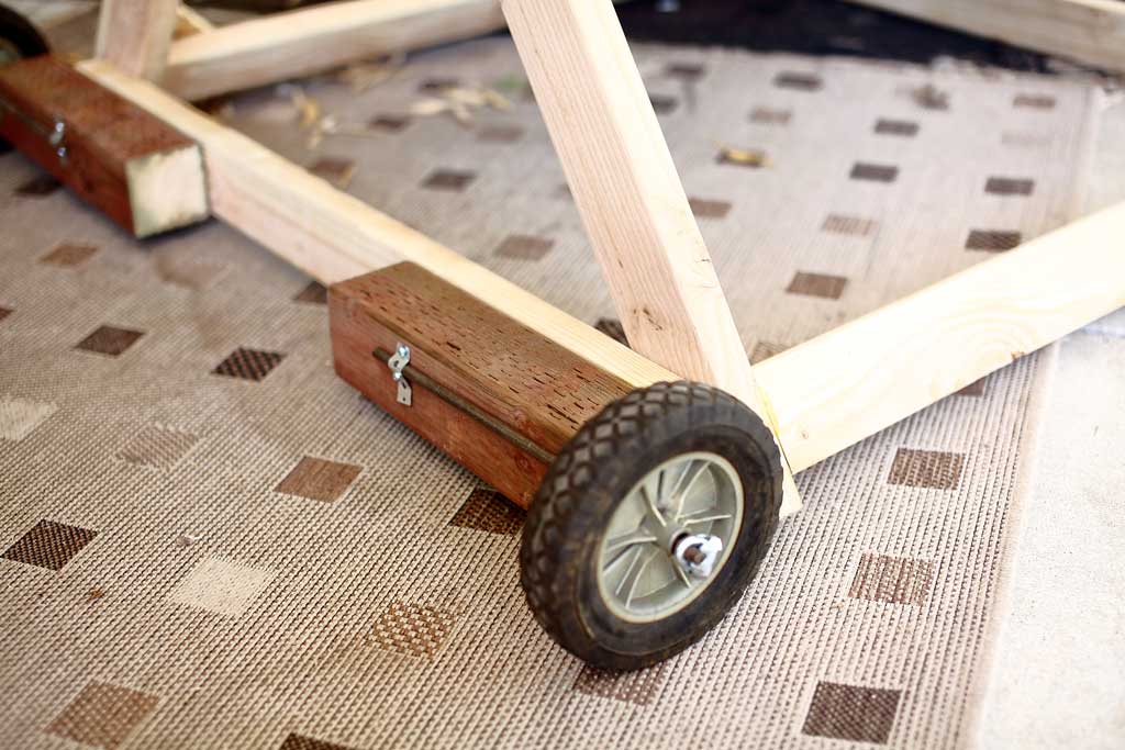 attaching wheels for DIY mobile triangle shape chicken coop