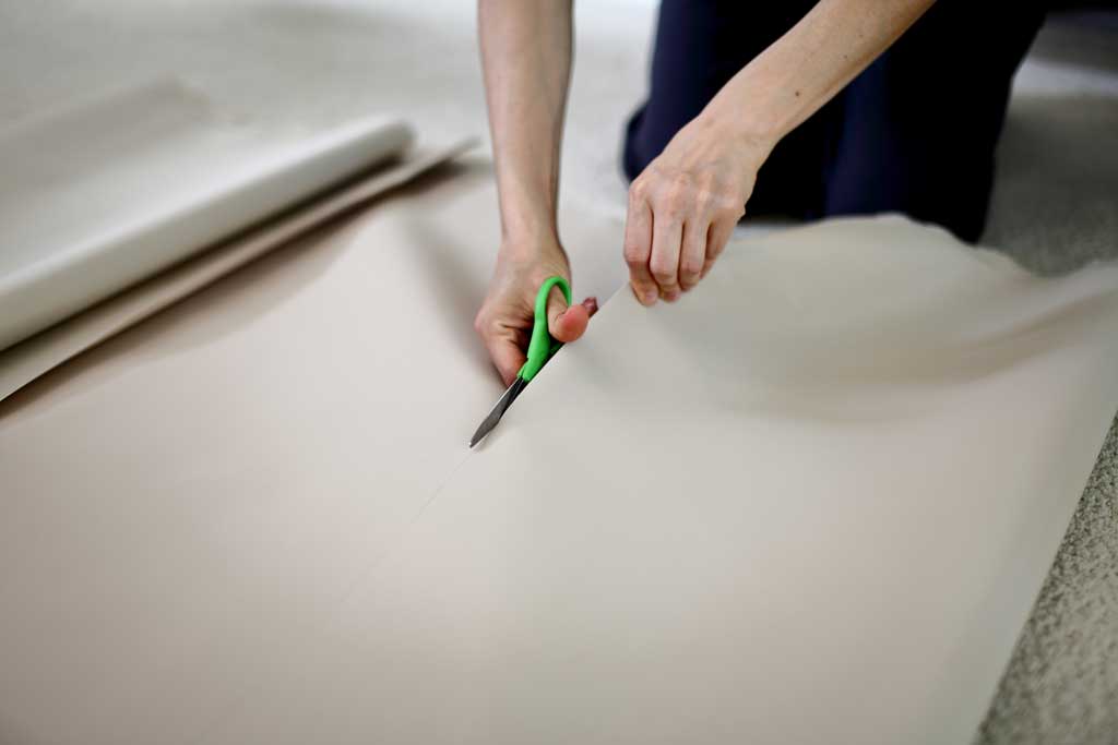 cutting fabric with scissors