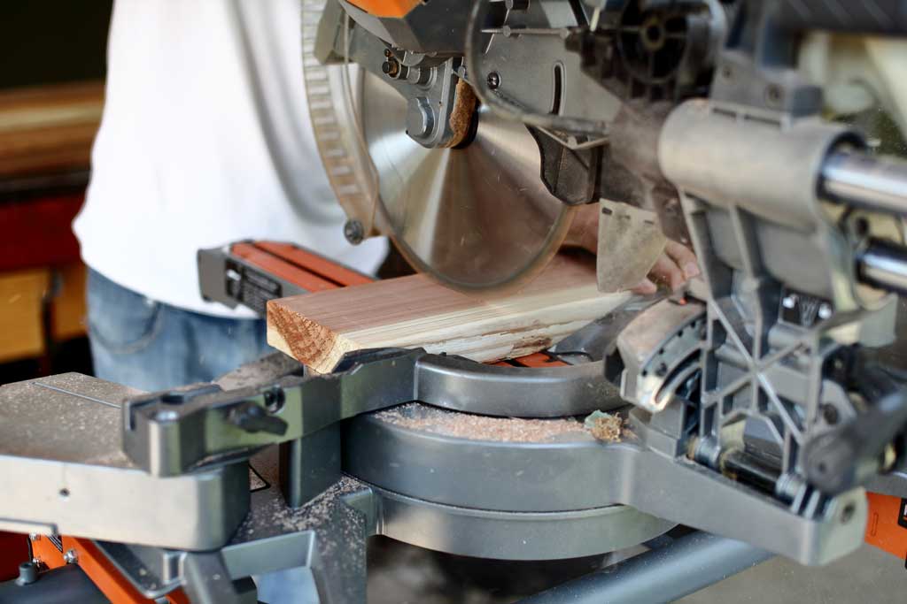 cutting wood with miter saw