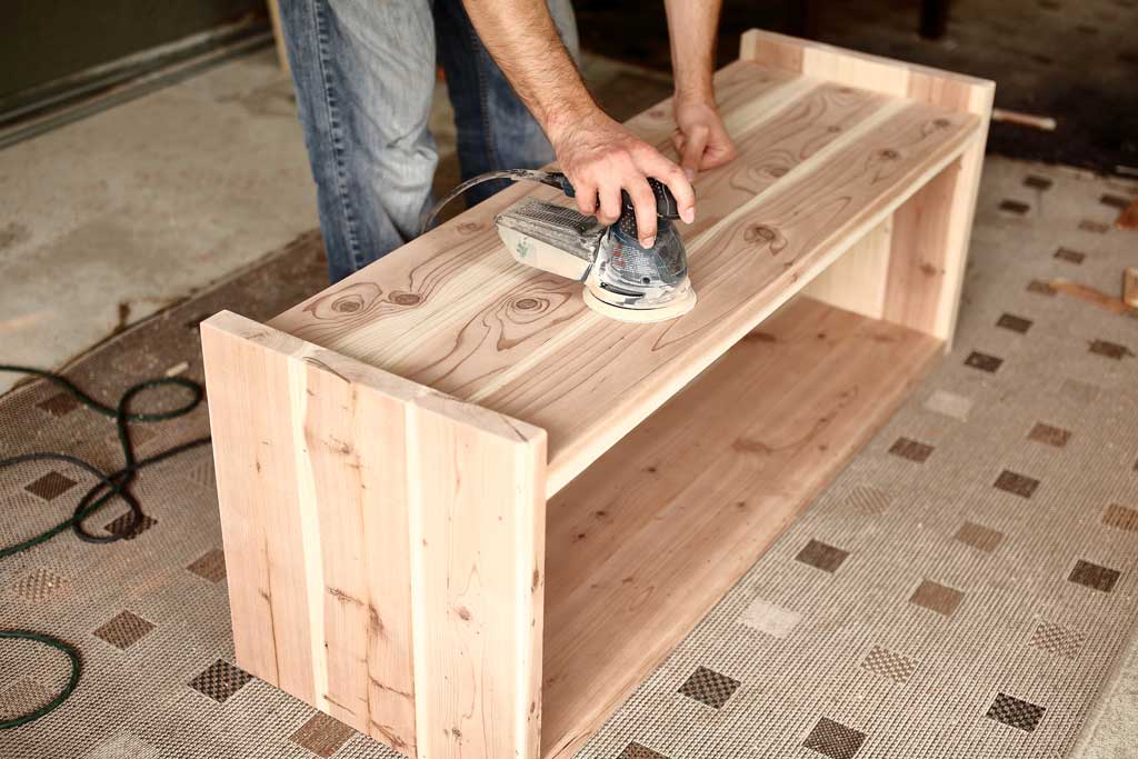 using random orbital sander to send bench